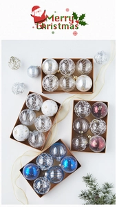 Close-up of 24 Christmas decorative balls in kraft boxes with pine needles and ribbons