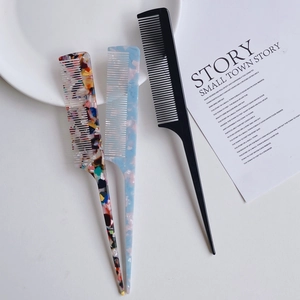Three acetate fine-tooth tail combs in assorted colors for hair styling and parting