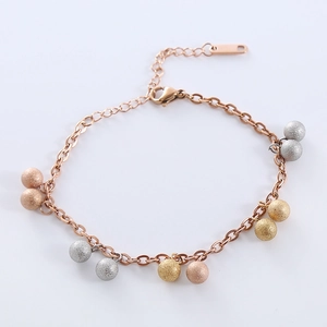 Elegant tri-color frosted steel bead bracelet with rose gold chain on white background