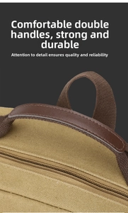Macro shot of durable khaki canvas backpack with reinforced brown leather and woven handles