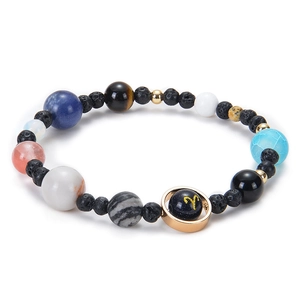 Bracelet galaxie du système solaire avec pierres bleues et lave noire pour Bélier