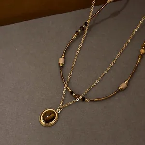 French vintage oval tiger eye stone double layer necklace with gold finish for women