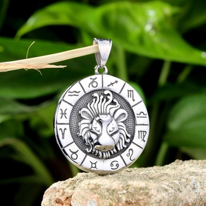 Detailed close-up of a silver stainless steel Leo pendant with zodiac symbols