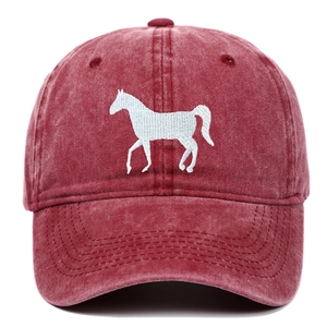 Detailed close-up of white horse embroidery on burgundy washed cotton baseball cap