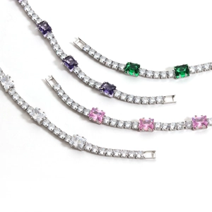 Tennis bracelet with emerald cut crystals and white zircon pave in white gold finish