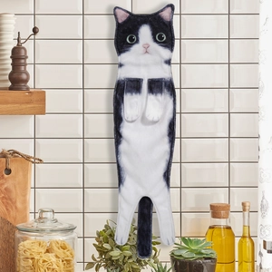 Detail of creative hanging hand towel featuring a realistic black and white cat design