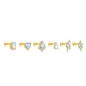 Detail view of 6 gold sterling silver stud earrings featuring opal stones in various shapes