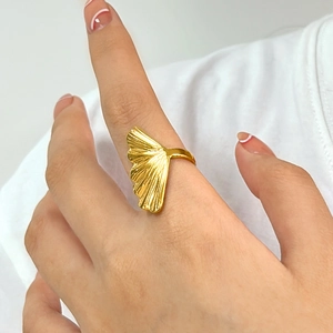 Detailed close-up of golden ginkgo leaf ring showing realistic leaf vein textures