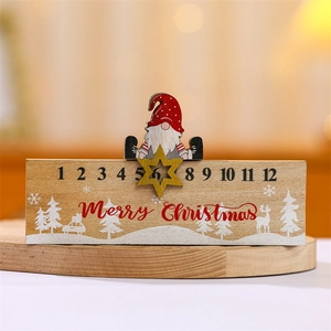 Macro detail of wooden Christmas countdown calendar with Santa Claus and star slider