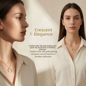 Detailed view of crescent moon pendant featuring micro-pave zirconia in 18K gold plating
