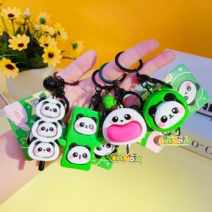 Set of four cute cartoon panda keychains with bamboo and panda-shaped charms for bags