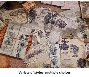 Macro view of vintage botanical paper pack featuring rose and palm illustrations