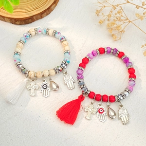 Bohemian kralenarmbanden met kleurrijke kwastjes en hand van Fatima hangers