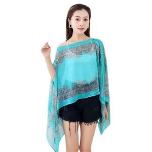 Lake blue chiffon shawl with vintage patterns and elegant pearl buckle on white background