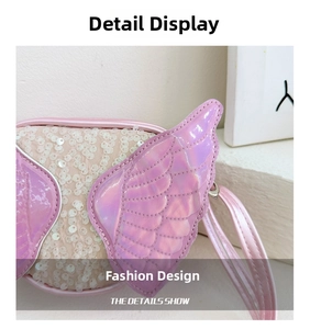 Detailed view of pink holographic wings and white sequins on a girls' crossbody bag