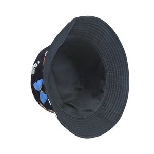 Reversible outdoor sun bucket hat with blue and white butterfly print on black fabric