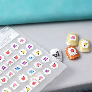 Detailed 5D embossed nail stickers featuring vintage lace frames and colorful rose floral designs
