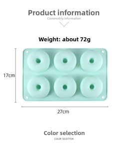 Detailed view of mint green 6-cavity silicone donut mold with precise dimensions 27x17cm
