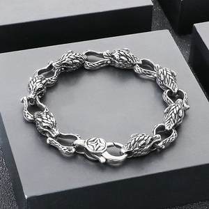 Men's vintage stainless steel wolf head link bracelet on black display box