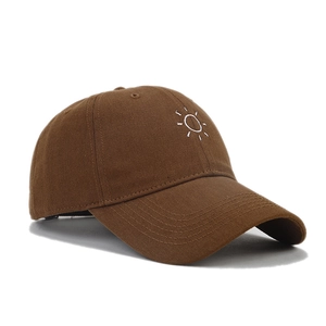 Coffee brown cotton baseball cap with white embroidered sun pattern and curved brim