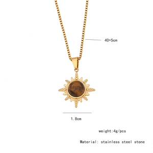Detail of vintage sunburst stainless steel necklace with dimensions and material specs