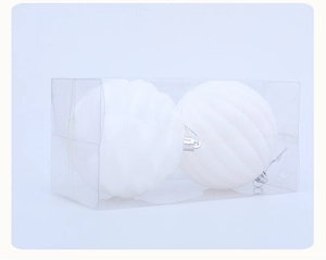 Two white ribbed Christmas ornaments in a clear box packaging for tree decoration