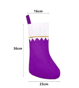 Detailed dimensions of purple felt Christmas stocking with gold trim and white cuff