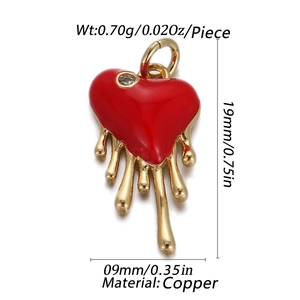 Detail of a copper red enamel heart pendant with dimensions 19mm by 9mm and weight 0.70g