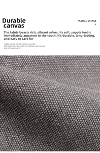 Macro detail of high-density dark grey canvas fabric showing the woven texture