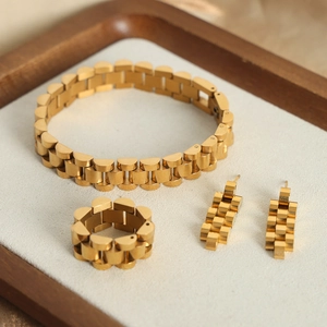 Elegant gold-plated titanium steel jewelry set featuring a geometric watch strap chain design