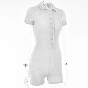 Detail of silver sequin playsuit showing lapel collar and button-down closure