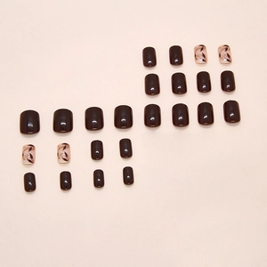 Retro brown shimmer leaf press-on nails in short round shape, 24 piece glossy set