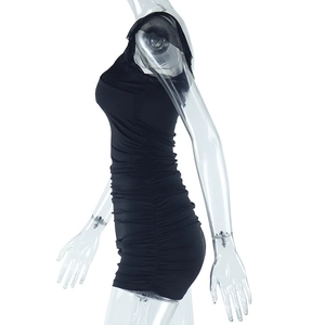 Side view of black ruched bodycon dress showing slim fit and pleated fabric texture