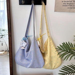 Hanging floral cotton tote bags in purple and yellow with cute flower charms