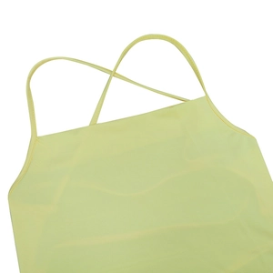 Detail of the back cross strap design on a sexy yellow backless summer maxi dress