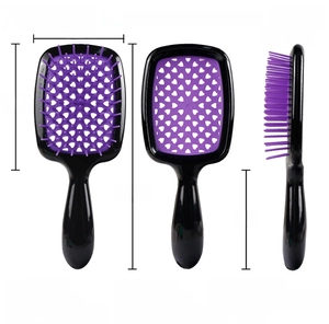 Three-way view of small hollow hair brush with dimensions and purple heart grid pattern