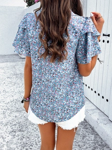 Rear view of floral chiffon top with multi-layer ruffle sleeves and pink floral print
