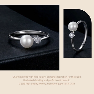 Detail view of 925 silver ring featuring a white freshwater pearl and Moissanite stone