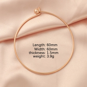 Detail view of 60mm rose gold stainless steel bangle with 1.5mm thickness and weight data
