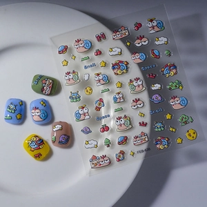 Cartoon snail and space themed nail art sticker set with colorful display manicure tips