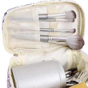Floral print large makeup bag with interior storage space for brushes and toiletries