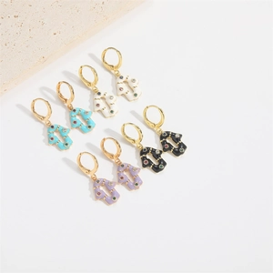 Hamsa Hand drop earrings in gold with white, blue, purple, and black enamel charms