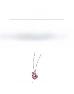 Détail du pendentif en forme de calebasse avec zircons rouges et blancs en or rose