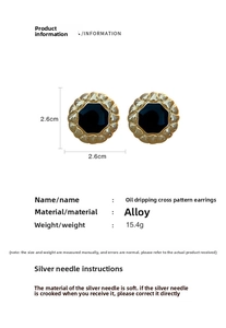 Detailed view of vintage gold enamel earrings with a 2.6cm diameter and silver needles