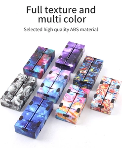 Collection of eight Infinity Cubes with starry, marble, and colorful pattern designs