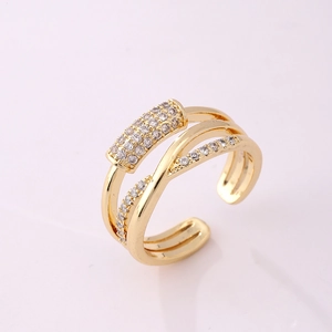 Detail of 18K gold plated multi-layer crisscross ring with micro-pave cubic zirconia