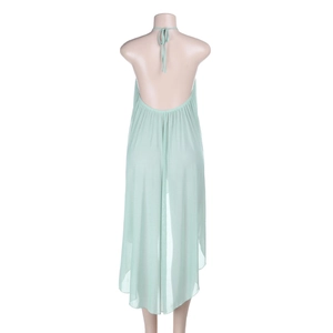 Vue arrière détaillée d'une robe dos nu en résille transparente vert clair à licou