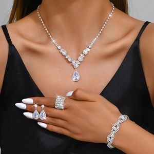 Elegant bridal jewelry set with sparkling teardrop crystals including necklace and earrings