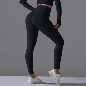 Detail of high waisted scrunch butt yoga pants with seamless compression fabric