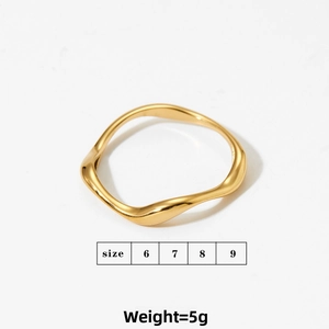 Close-up of polished 18K gold irregular wavy ring showing smooth texture and size details